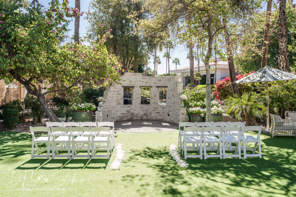 Intimate wedding ceremony at The Scott Resort with lush greenery captured my Scottsdale elopement photographer, Depoy Studios.