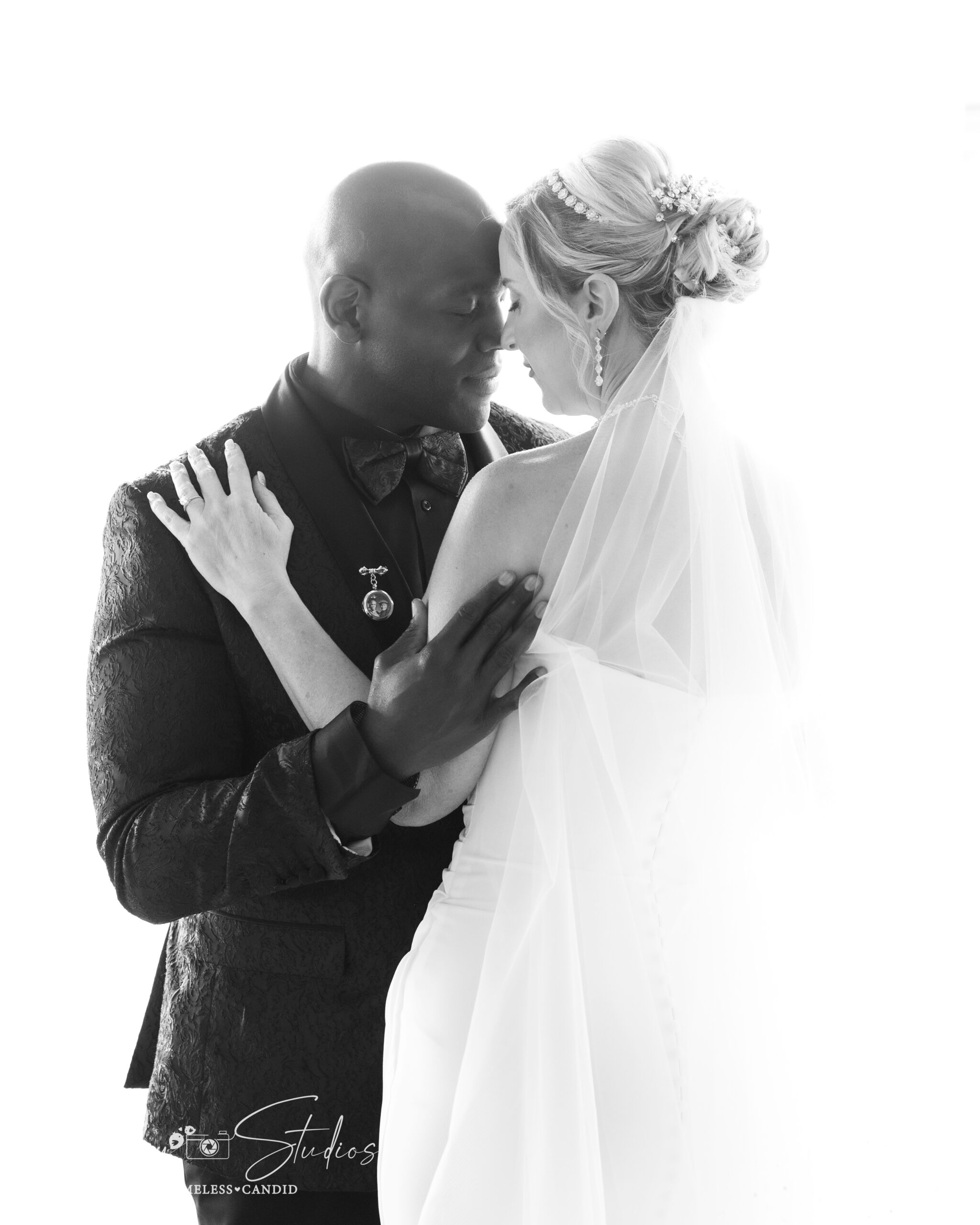 Romantic wedding photo of an interracial couple at SoHo63, a modern Arizona wedding venue.