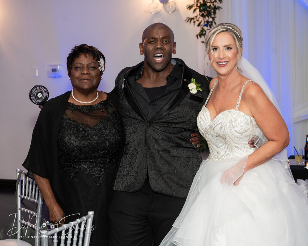 Bride and groom laughing while dancing at their SoHo63 wedding reception.